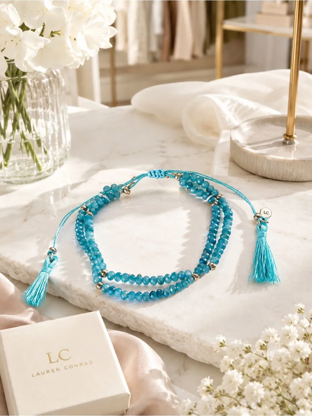 LC Lauren Conrad Aqua December Birthstone Bracelet Tassel Beaded Adjustable NWT